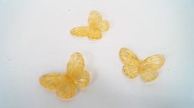 Пластмасови пеперуди за декорация в торбичка жълти