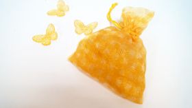 Пластмасови пеперуди за декорация в торбичка жълти