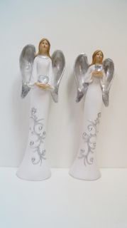 Ангел със сърце и сребърни крила