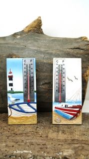 Термометър с фар и лодка
